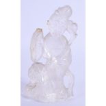 A 19TH CENTURY CHINESE CARVED ROCK CRYSTAL FIGURE OF GUANYIN modelled holding foliage. 12 cm x 5 cm.