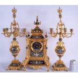 A RARE 19TH CENTURY FRENCH GILT BRASS AND LIMOGES ENAMEL CLOCK GARNITURE decorated with 17th century