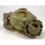 A CHINESE JADE BRUSH WASHER. 11 cm x 6 cm.