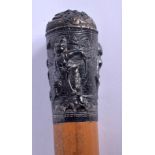 A 19TH CENTURY THAI ASIAN SILVER TOPPED MALACCA WALKING CANE depicting roaming buddhistic figures. 9