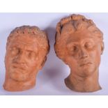 A PAIR OF ANTIQUE FRENCH TERRACOTTA CARVED MASK HEADS After Leonce Rabillon (1814-1886). 30 cm x 14