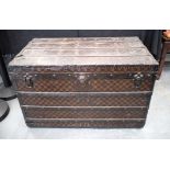 A GOOD VINTAGE FRENCH LOUIS VUITTON TRAVELLING TRUNK of typical form. 84 cm x 51 cm x 51 cm.