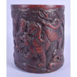 A 19TH CENTURY CHINESE CARVED BAMBOO BRUSH POT Bitong, Qing, decorated with figures fighting with a