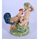 A RARE 1930S DULWICH POTTERY FIGURE OF A PUTTI modelled by Jessamine S Bray & Sybil V Williams. 6 cm