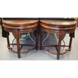 A RARE PAIR OF 19TH CENTURY CHINESE CARVED HONGMU DEMI LUNE CONSOLE TABLES Qing, of highly unusual f