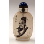 A CHINESE REVERSE PAINTED SNUFF BOTTLE. 10.5 cm high.