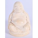 A 19TH CENTURY CHINESE CARVED IVORY FIGURE OF A BUDDHA Qing. 7 cm x 4 cm.