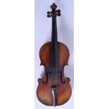 AN EARLY 20TH CENTURY SINGLE PIECE BACK VIOLIN. 58 cm long.