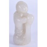 A 19TH CENTURY CHINESE CARVED GREY WHITE JADE FIGURE OF A BOY modelled riding upon a swan. 6.5 cm x