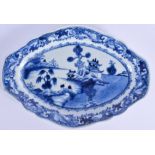 AN 18TH CENTURY CHINESE BLUE AND WHITE DISH Qianlong, painted with landscapes. 30 cm x 20 cm.