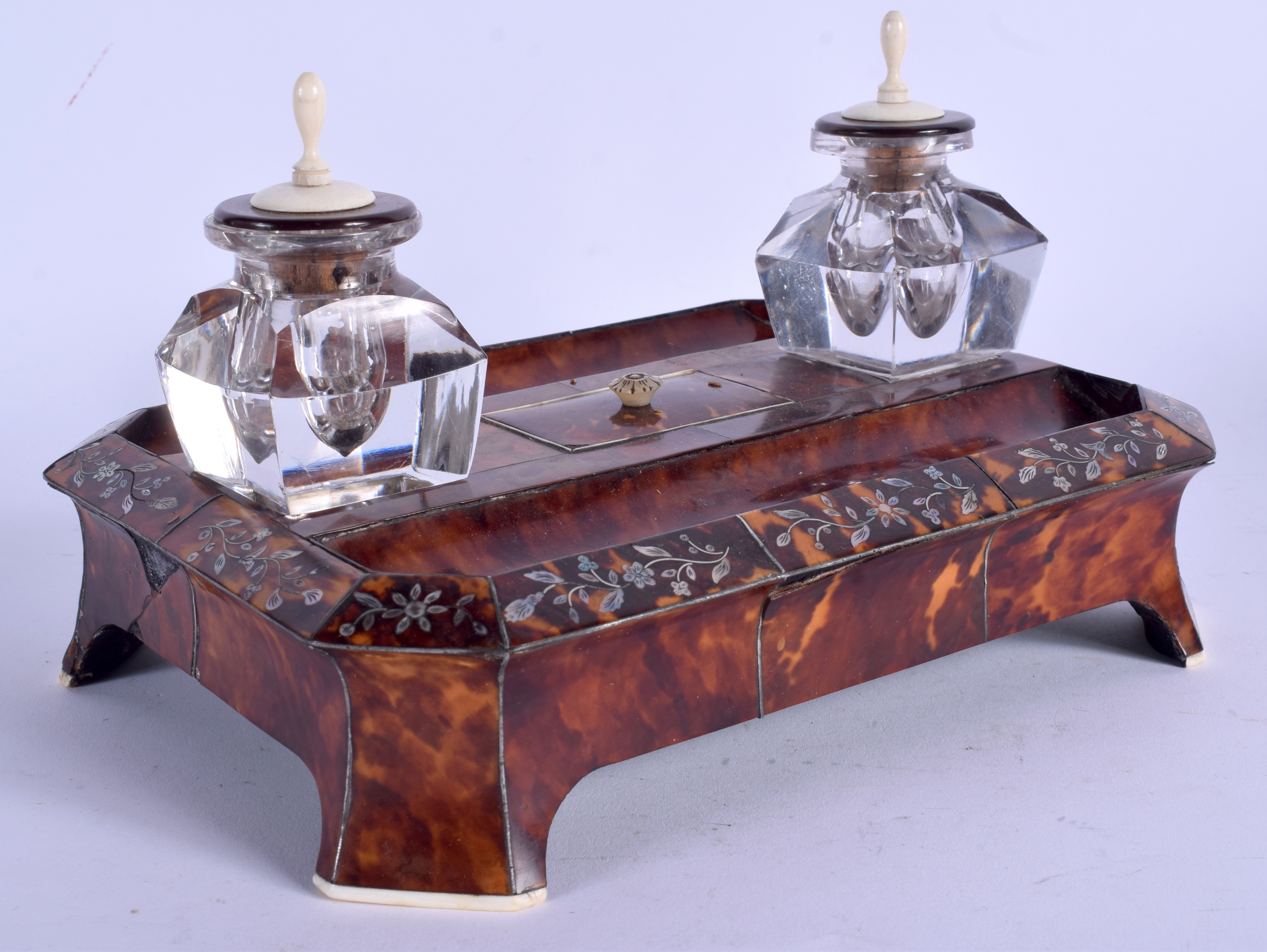 AN EARLY VICTORIAN MOTHER OF PEARL INLAID TORTOISESHELL INKWELL decorated with foliage. 21 cm x 14 c