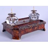 AN EARLY VICTORIAN MOTHER OF PEARL INLAID TORTOISESHELL INKWELL decorated with foliage. 21 cm x 14 c