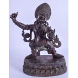 AN 18TH/19TH CENTURY CHINESE TIBETAN BRONZE FIGURE OF A BUDDHISTIC DEITY Qing, modelled as a scowlin