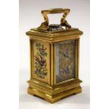 A SILVER GILT RUSSIAN MINIATURE CLOCK. 10 cm high inc handle.