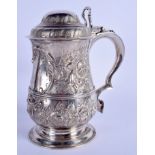 A GEORGE III SILVER STEIN by William & James Priest, decorated with foliage. London 1766. 22 cm 14 c