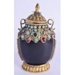 A 19TH CENTURY CHINESE TIBETAN JEWELLED SNUFF BOTTLE AND STOPPER decorated with turquoise and rubies