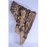 A 17TH/18TH CENTURY NORTH EUROPEAN CARVED AND POLYCHROMED WOOD HANGING ANGEL decorated with motifs.