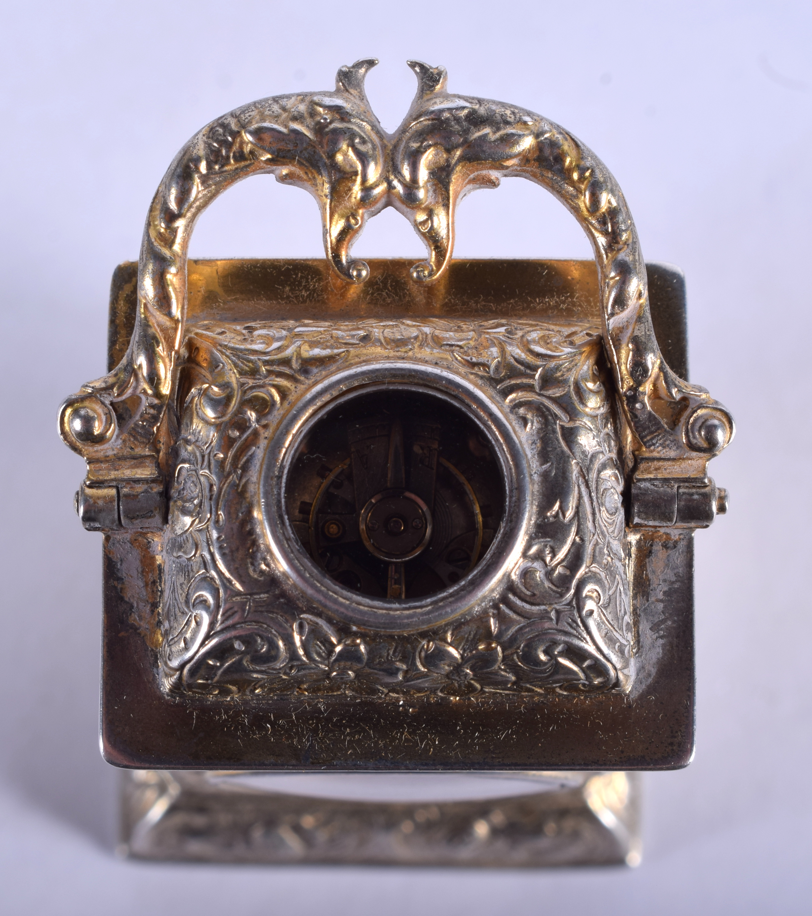 A LOVELY ANTIQUE MINIATURE TRAVELLING SILVER GILT CLOCK decorated with foliage and vines. 8.75 cm hi - Image 6 of 8