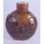 A 19TH CENTURY CHINESE CARVED RUSSET JADE SNUFF BOTTLE Qing. 5.75 cm x 4.5 cm.