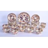Regency Derby imari service of twelve teacups and saucer and a bread and butter dish in the Witches