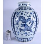 A LARGE CHINESE BLUE AND WHITE BARREL FORM VASE 20th Century, painted with dragons and phoenix birds