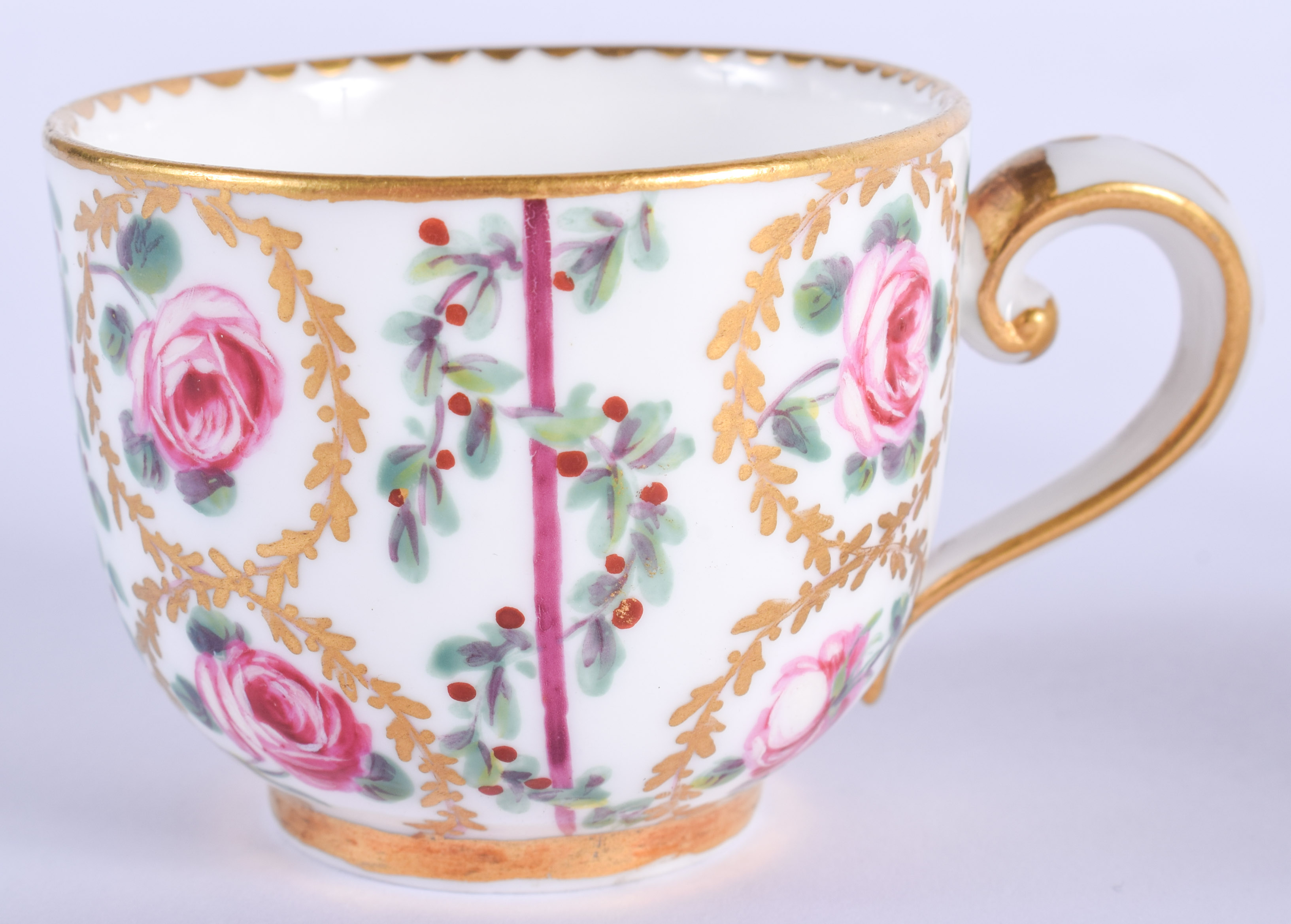 AN 18TH CENTURY SEVRES PORCELAIN CUP AND SAUCER painted with roses and gilt vines. (2) - Image 2 of 3