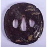 A 19TH CENTURY JAPANESE MEIJI PERIOD IRON SAMURAI TSUBA silver and gold inlaid with a farmer. 7.5 cm