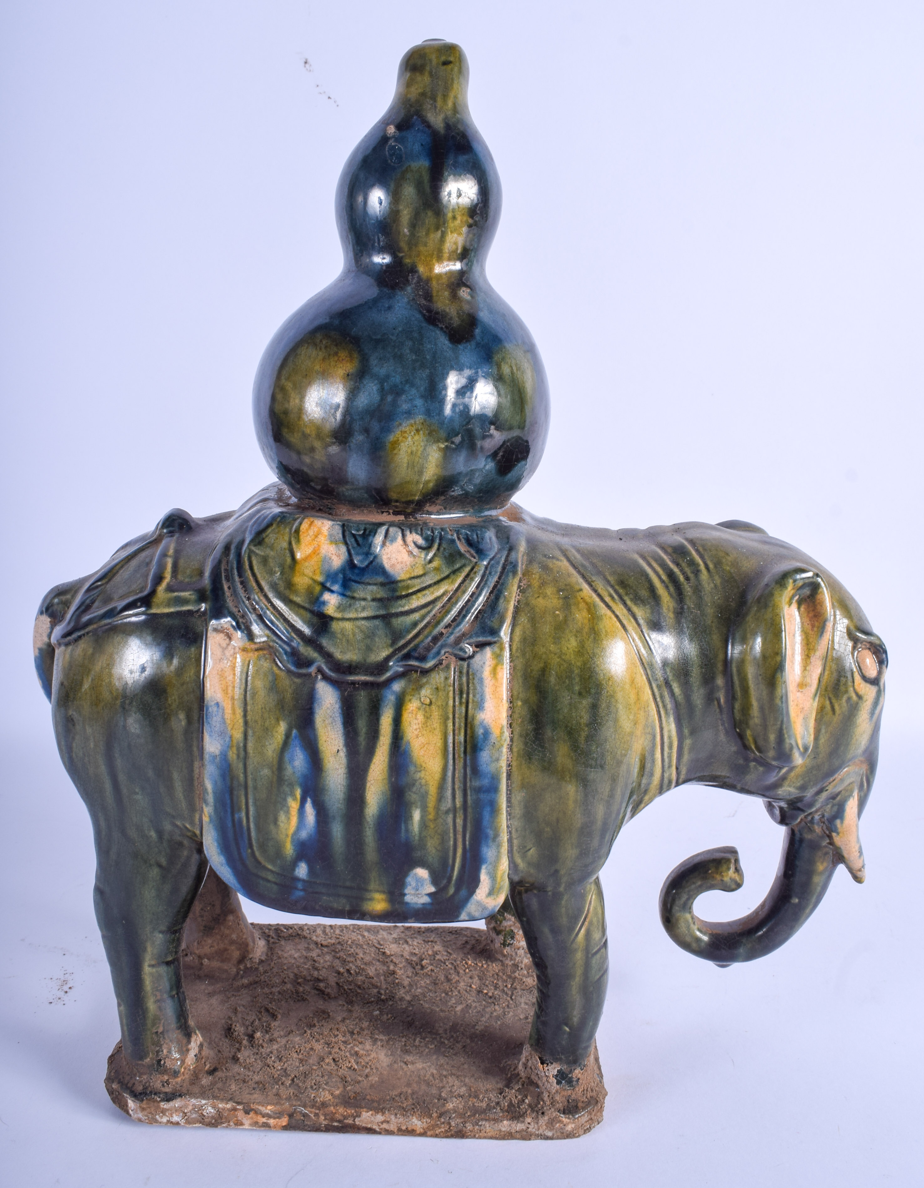 A LARGE CHINESE MAJOLICA EARTHENWARE POTTERY ELEPHANT 20th Century, with drip glazed decoration. 33 - Image 2 of 3