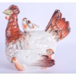 AN EARLY 19TH CENTURY YORKSHIRE POTTERY HEN TUREEN AND COVER modelled with chicks. 18 cm x 18 cm.