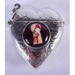 A SILVER AND ENAMEL HEART SHAPED VESTA. 3 cm wide.