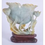 AN EARLY 20TH CENTURY CHINESE CARVED JADEITE BRUSH WASHER Qing, of naturalistic form. Jadeite 10 cm