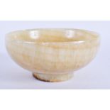 A 19TH CENTURY CENTURY CONTINENTAL CARVED QUARTZ STONE BOWL. 10 cm wide.