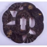 A 19TH CENTURY JAPANESE MEIJI PERIOD IRON SAMURAI TSUBA decorated with fans and foliage. 7.25 cm wid