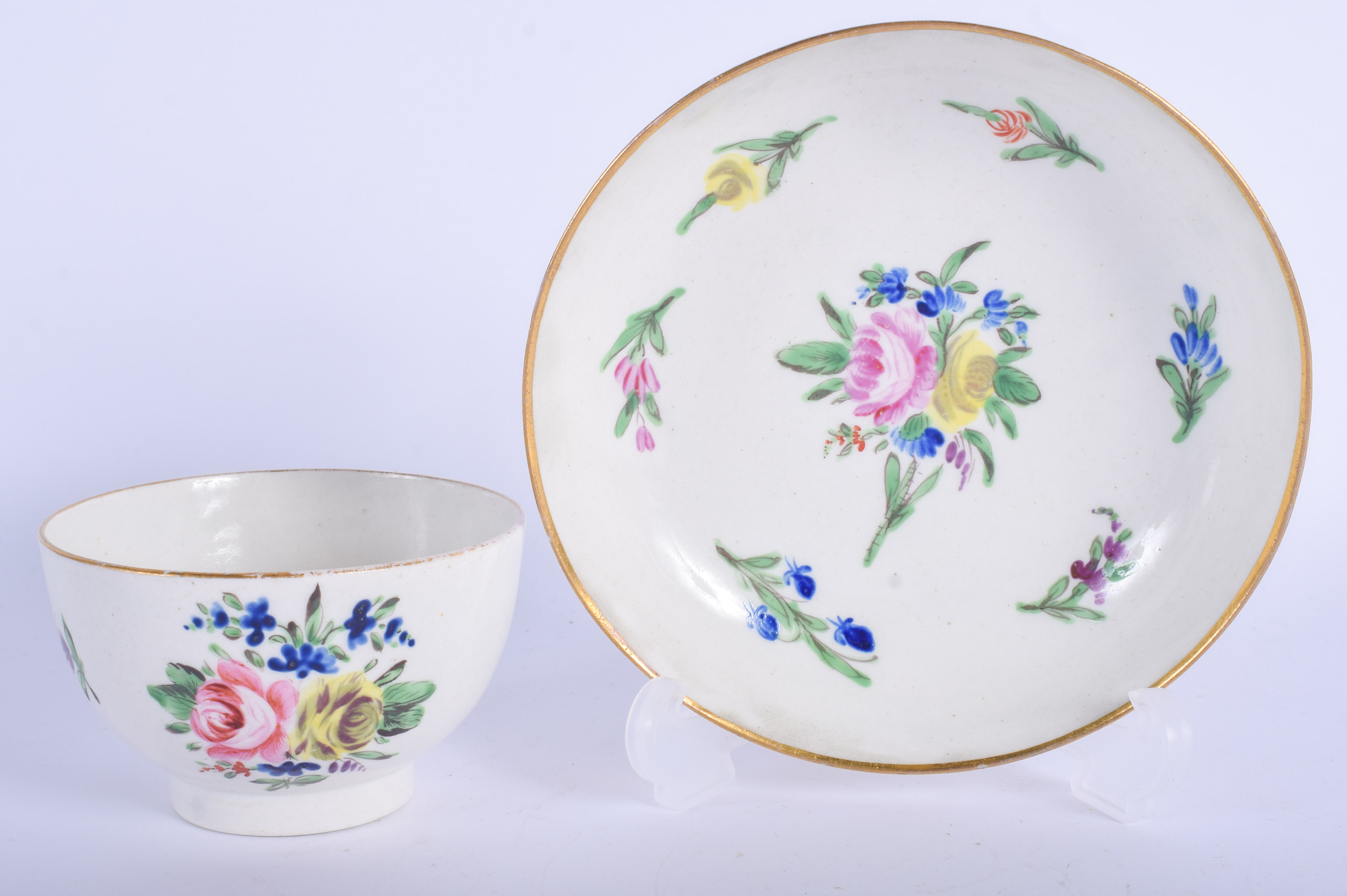 18th c. Caughley teabowl and saucer painted with back to back roses.