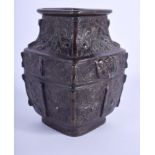 A 17TH CENTURY CHINESE BRONZE SQUARE FORM VASE Ming, decorated with maskheads and motifs. 15 cm high