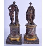 A PAIR OF 19TH CENTURY CONTINENTAL BRONZE FIGURES OF A CLASSICAL MALE AND FEMALE probably Italian, m