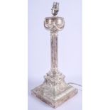 A LARGE ANTIQUE SILVER PLATED CANDLESTICK converted to a lamp. Stick 38 cm high.