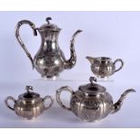 A 19TH CENTURY CHINESE FOUR PIECE SILVER TEASET decorated with bamboo and foliage. 1575 grams. Large