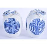 A PAIR OF 19TH CENTURY CHINESE BLUE AND WHITE VASES Qing, bearing Yongzheng marks to base, overlaid