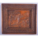 AN 18TH CENTURY CONTINENTAL FRUITWOOD PLAQUE C1750 depicting a romantic country landscape scene. 20