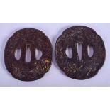 TWO 19TH CENTURY JAPANESE EDO PERIOD IRON TSUBA decorated with foliage. 7 cm wide.