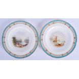 19th c. Minton pair of plates each painted with watery landscapes under a turquoise and gilt border.