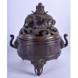 A CHINESE QING DYNASTY BRONZE CENSER AND COVER modelled as a recumbent elephant, supported upon elep