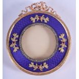 AN UNUSUAL CONTINENTAL GOLD AND ENAMEL GEM SET PHOTOGRAPH FRAME decorated with foliage. 102 grams ov