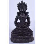 A 19TH CENTURY CHINESE BRONZE EROTIC FIGURE OF BUDDHISTIC DEITY modelled upon a triangular base. 21