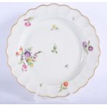 18th c. Worcester plate painted with coloured flowers. 21cm diameter.