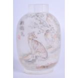 A 1960S CHINESE REVERSE PAINTED GLASS SNUFF BOTTLE painted with a hound within a landscape. 8 cm hig