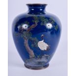 AN EARLY 20TH CENTURY JAPANESE MEIJI PERIOD CLOISONNE ENAMEL VASE decorated with birds under a tree.