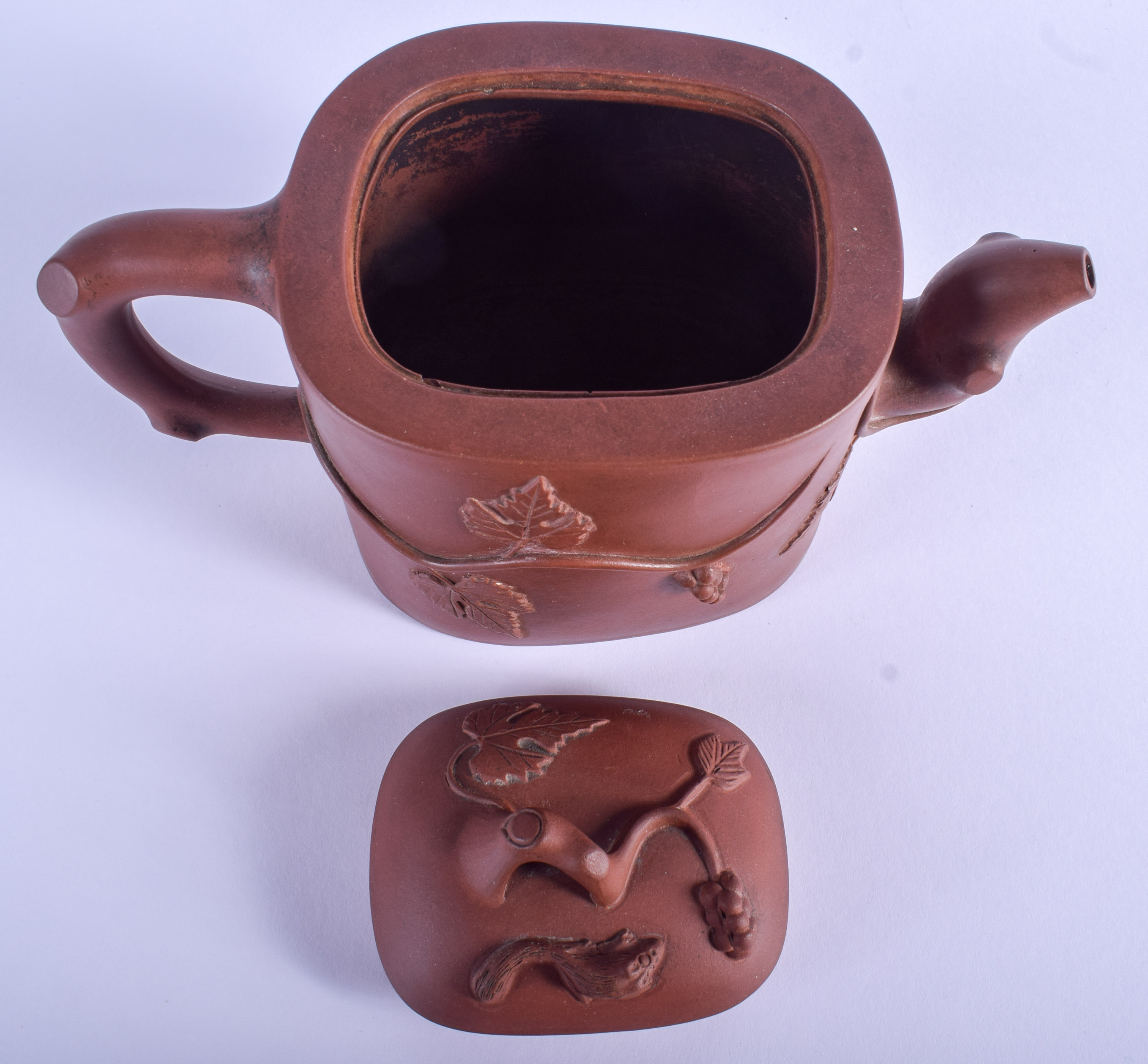 AN EARLY 20TH CENTURY CHINESE YIXING POTTERY TEAPOT AND COVER decorated with foliage. 18 cm wide. - Image 3 of 6