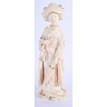 A LARGE 19TH CENTURY JAPANESE MEIJI PERIOD CARVED IVORY OKIMONO modelled as a standing geisha holdin
